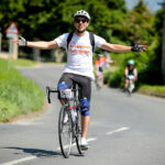 Matt is wearing a Homeless Oxfordshire T-shirt whilst on his bike, completing Bike Oxford
